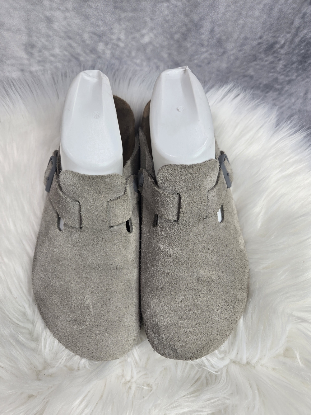 Birkenstock Boston suede clogs feature a soft footbed and an adjustable strap